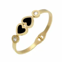 Pulsera dorada fina con dos pequeños corazones y un círculo con números romanos y un cristal en el centro.