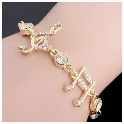 Brazalete dorado notas musicales mujer | Bisujoya