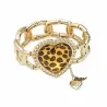 Pulsera elástica dorada para mujer con un dije de corazón y cuentas de cristal brillantes.