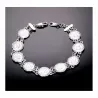 Pulsera de mujer con monedas francesas de plata envejecida y cobre rosado.