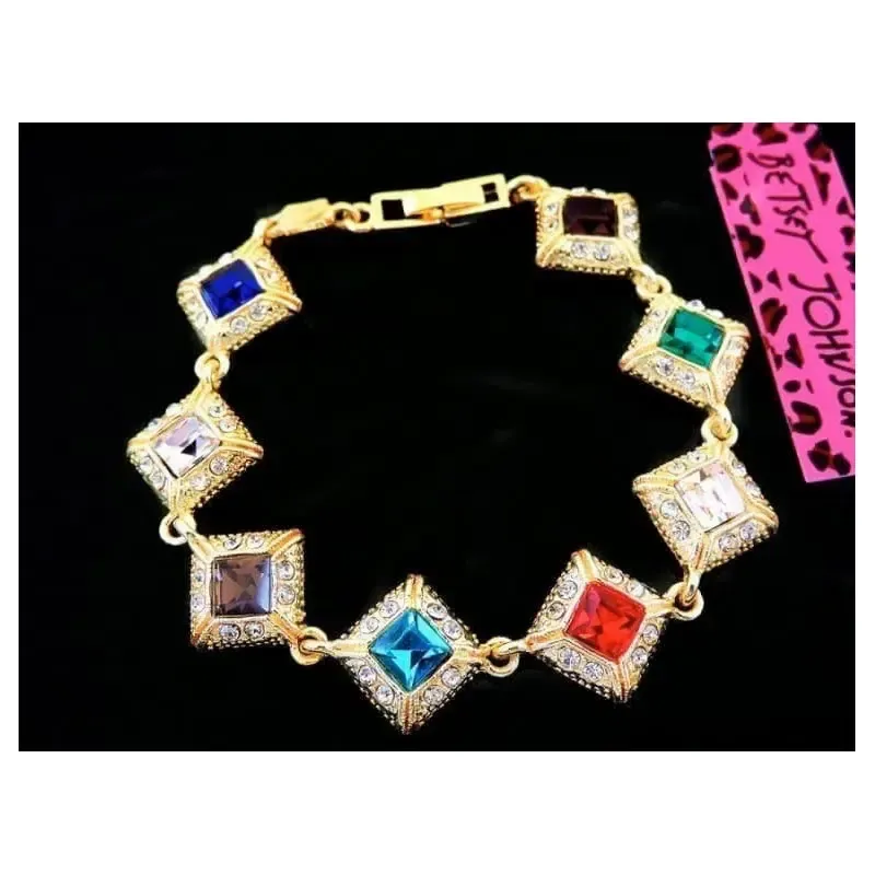 Pulsera vivos colores acero bañado oro 9k cristales largo 21cm ancho 1,5cm