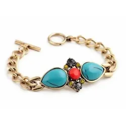 Pulsera de fantasía fabricada en bronce con piedras de colores y diseño elegante.