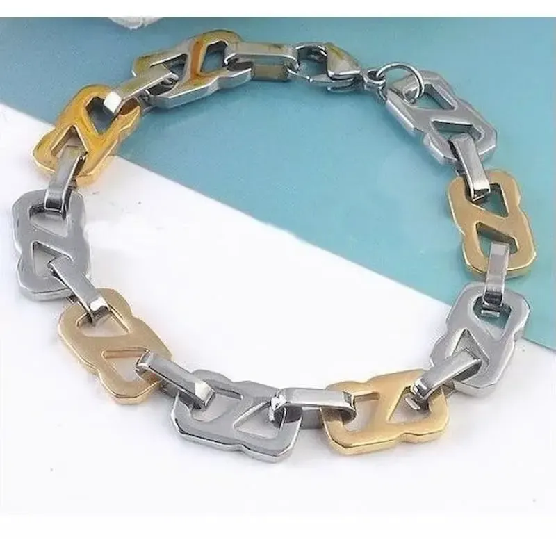 Pulsera de fantasía fabricada en bronce con piedras de colores y diseño elegante.