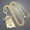 Colgante Jesús bisutería hombre con rostro 5,5cm oro 18K y cadena 4mm, sobre fondo negro.