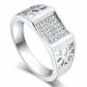 Anillo bisutería unisex con baño plata 925 y cristal blanco brillante, sobre fondo gris.