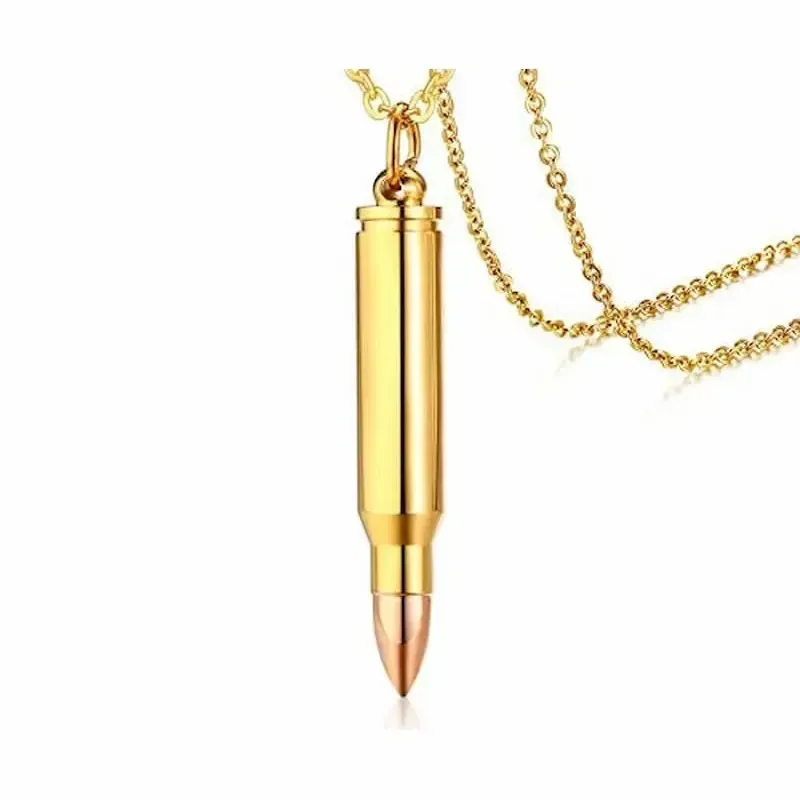 Colgante bala bisutería hombre con cadena 49cm acero dorado para cenizas, sobre fondo gris oscuro.
