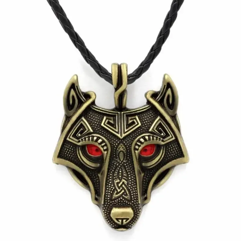 Collar bisutería hombre con cabeza de loba 4,5cm y ojos color, sobre fondo oscuro.