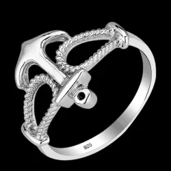 Anillo de plata esterlina con forma de ancla marina, acabado pulido y diseño detallado.