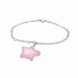 Pulsera de plata esterlina con piedra de cuarzo rosa natural, acabado brillante y forma irregular.