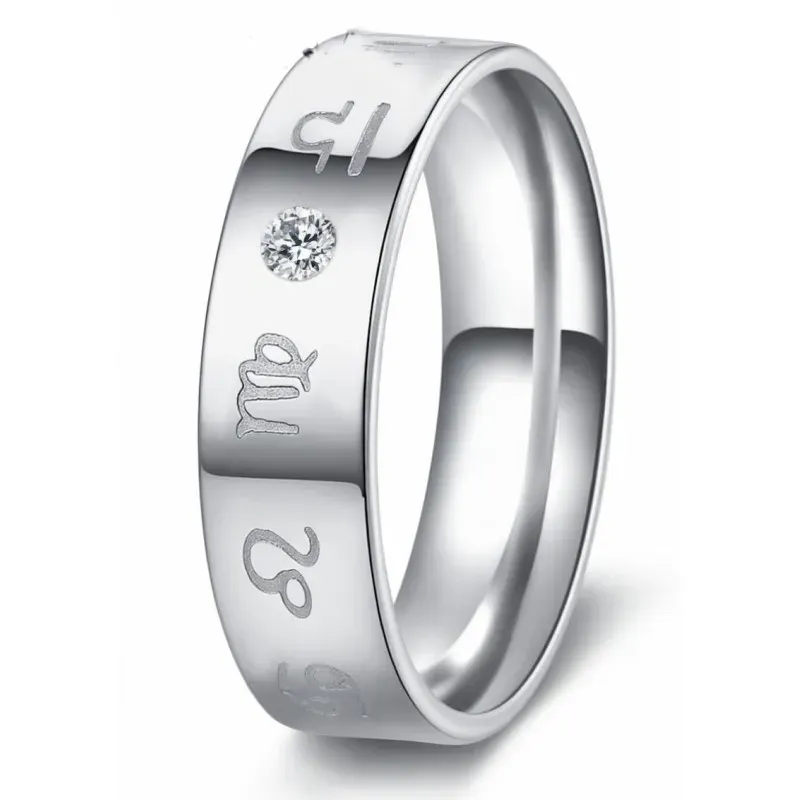 Anillo de acero inoxidable con grabado rúnico y piedra circonia en el centro