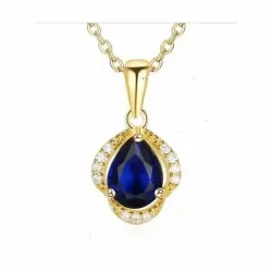 Colgante de cristal azul brillante con pequeños destellos en una cadena dorada fina.