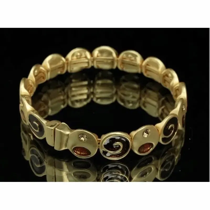 Pulsera dorada con piedras topacio y cierre magnético circular
