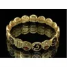 Pulsera dorada con piedras topacio y cierre magnético circular