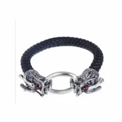 Brazalete de cuero trenzado con una cabeza de dragón de metal envejecido en el extremo.